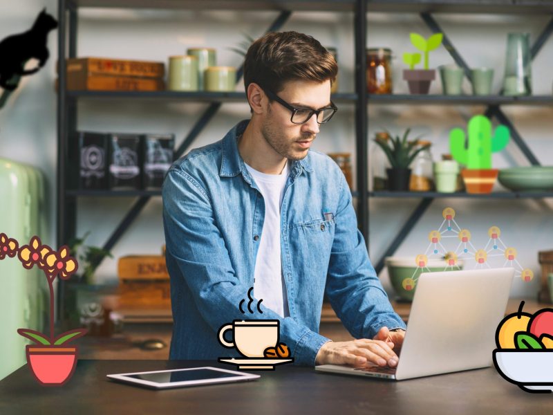 guy-working-laptop-having-icons-surrounding-him